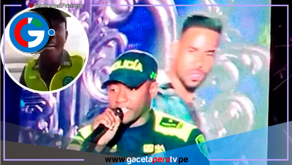 Policía canta junto a Romeo Santos en concierto