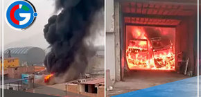 Ate: bomberos combaten siniestro en taller mecánico de buses