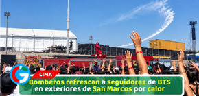 Bomberos refrescan a seguidoras de BTS en exteriores de San Marcos por calor